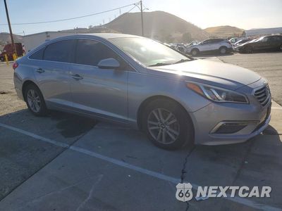 Czwarte zdjęcie samochodu z boku: 2015 HYUNDAI SONATA SE VIN:5NPE24AF1FH035202 - miniatura
