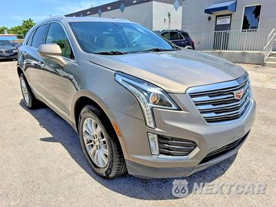 Czwarte zdjęcie samochodu z boku: 2017 CADILLAC XT5 VIN:1GYKNARS2HZ240947 - miniatura