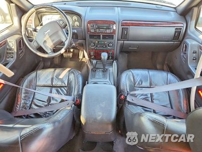 Zdjęcie 8 z 12 samochodu: 2001 JEEP GRAND CHEROKEE LIMITED VIN:1J4GW58N61C519221 - miniatura