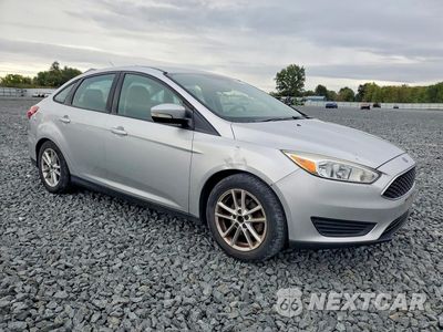 Czwarte zdjęcie samochodu z boku: 2016 FORD FOCUS SE VIN:1FADP3F20GL293081 - miniatura