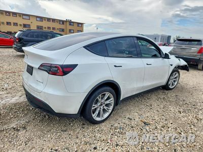 Trzecie zdjęcie samochodu z tyłu: 2022 TESLA MODEL Y VIN:7SAYGDEE1NF510038 - miniatura