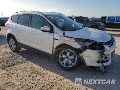 Czwarte zdjęcie samochodu z boku: 2014 FORD ESCAPE TITANIUM VIN:1FMCU0J99EUD00646 - miniatura