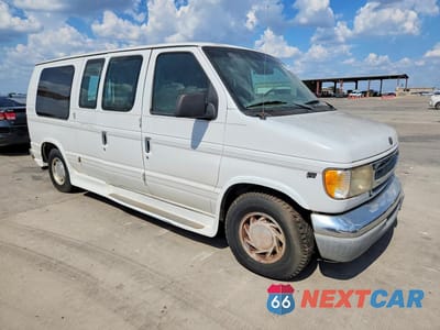Czwarte zdjęcie samochodu z boku: 2000 FORD ECONOLINE E150 VAN VIN:1FDRE14W2YHC07270 - miniatura