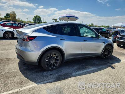 Trzecie zdjęcie samochodu z tyłu: 2024 TESLA MODEL Y VIN:7SAYGDEE8RA293980 - miniatura