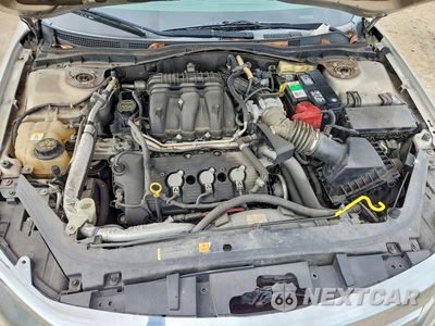 Zdjęcie 11 z 12 samochodu: 2010 FORD FUSION SE VIN:3FAHP0HG2AR214320 - miniatura