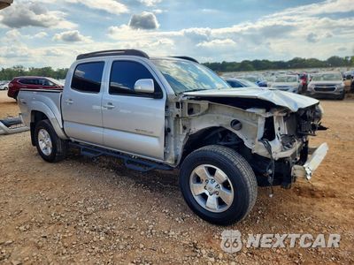 Czwarte zdjęcie samochodu z boku: 2013 TOYOTA TACOMA V6 VIN:5TFLU4EN2DX079522 - miniatura