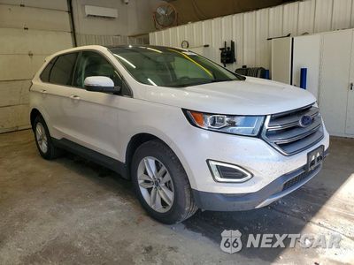 Czwarte zdjęcie samochodu z boku: 2016 FORD EDGE VIN:2FMPK4J83GBC61664 - miniatura