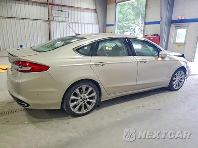 Trzecie zdjęcie samochodu z tyłu: 2017 FORD FUSION TITANIUM VIN:3FA6P0K98HR198927 - miniatura