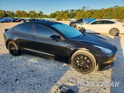 Czwarte zdjęcie samochodu z boku: 2021 TESLA MODEL 3 VIN:5YJ3E1EA9MF920304 - miniatura