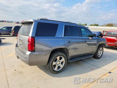 Trzecie zdjęcie samochodu z tyłu: 2020 CHEVROLET TAHOE C1500 LT VIN:1GNSCBKC3LR142806 - miniatura