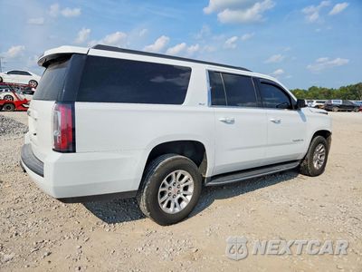 Trzecie zdjęcie samochodu z tyłu: 2019 GMC YUKON XL K1500 SLT VIN:1GKS2GKCXKR161316 - miniatura