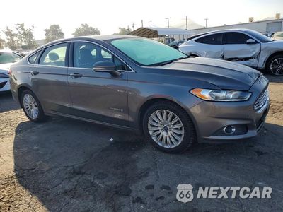 Czwarte zdjęcie samochodu z boku: 2014 FORD FUSION SE HYBRID VIN:3FA6P0LU8ER316621 - miniatura