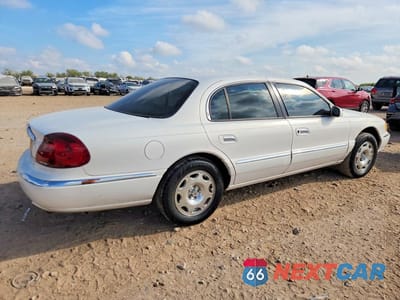 Trzecie zdjęcie samochodu z tyłu: 1998 LINCOLN CONTINENTAL VIN:1LNFM97V3WY640553 - miniatura