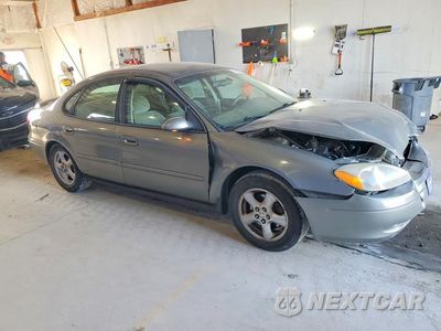 Czwarte zdjęcie samochodu z boku: 2003 FORD TAURUS SES VIN:1FAFP55253A167309 - miniatura