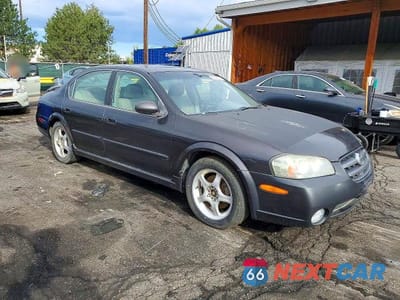 Czwarte zdjęcie samochodu z boku: 2002 NISSAN MAXIMA GXE VIN:JN1DA31D42T430832 - miniatura