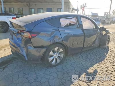 Trzecie zdjęcie samochodu z tyłu: 2023 TESLA MODEL Y VIN:7SAYGDEE4PA207920 - miniatura