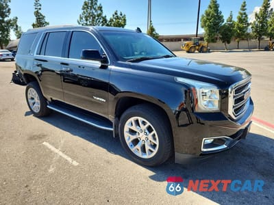 Czwarte zdjęcie samochodu z boku: 2019 GMC YUKON SLT VIN:1GKS1DKCXKR405774 - miniatura