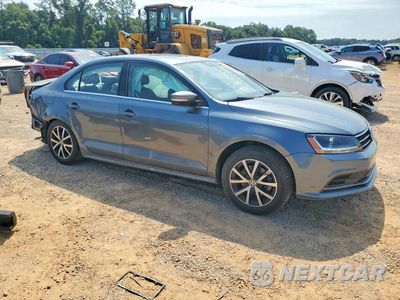 Czwarte zdjęcie samochodu z boku: 2017 VOLKSWAGEN JETTA SE VIN:3VWDB7AJ3HM272463 - miniatura