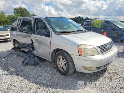 Czwarte zdjęcie samochodu z boku: 2007 FORD FREESTAR SEL VIN:2FMZA52267BA03196 - miniatura