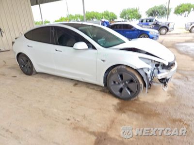 Czwarte zdjęcie samochodu z boku: 2021 TESLA MODEL 3 VIN:5YJ3E1EA4MF092095 - miniatura