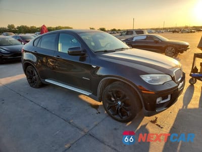 Czwarte zdjęcie samochodu z boku: 2013 BMW X6 XDRIVE50I VIN:5UXFG8C53DL591035 - miniatura