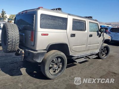 Trzecie zdjęcie samochodu z tyłu: 2003 HUMMER H2 VIN:5GRGN23U53H122738 - miniatura
