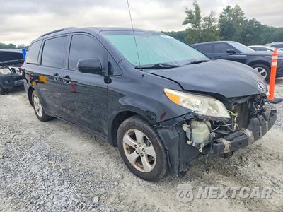 Czwarte zdjęcie samochodu z boku: 2014 TOYOTA SIENNA XLE 8-PASSENGER VIN:5TDYK3DCXES469359 - miniatura