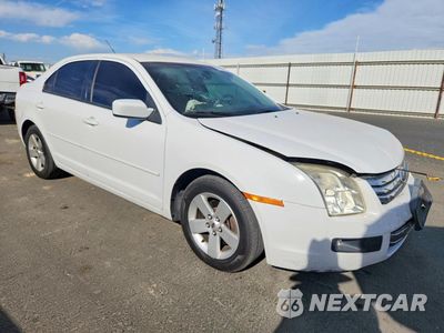 Czwarte zdjęcie samochodu z boku: 2007 FORD FUSION SE VIN:3FAHP07107R211079 - miniatura