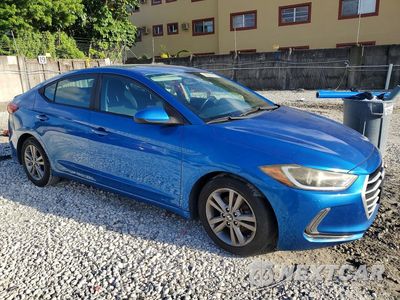 Czwarte zdjęcie samochodu z boku: 2017 HYUNDAI ELANTRA VALUE EDITION VIN:KMHD84LF6HU254264 - miniatura