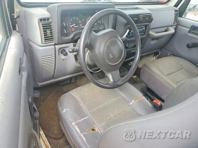 Zdjęcie 8 z 13 samochodu: 1997 JEEP WRANGLER / TJ SE VIN:1J4FY29PXVP403278 - miniatura
