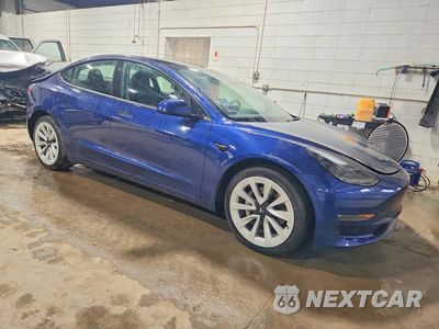 Czwarte zdjęcie samochodu z boku: 2023 TESLA MODEL 3 VIN:5YJ3E1EB1PF596486 - miniatura