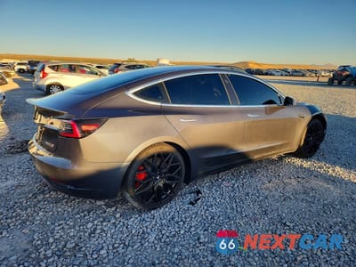 Trzecie zdjęcie samochodu z tyłu: 2020 TESLA MODEL 3 VIN:5YJ3E1EC3LF623724 - miniatura