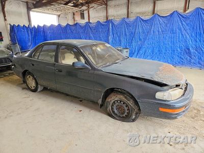Czwarte zdjęcie samochodu z boku: 1994 TOYOTA CAMRY LE VIN:4T1SK12E8RU437313 - miniatura