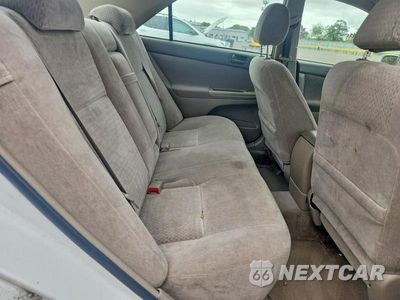Zdjęcie 10 z 12 samochodu: 2003 TOYOTA CAMRY LE VIN:4T1BE32K73U163800 - miniatura