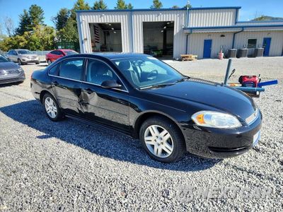 Czwarte zdjęcie samochodu z boku: 2014 CHEVROLET IMPALA LIMITED LT VIN:2G1WB5E38E1130486 - miniatura