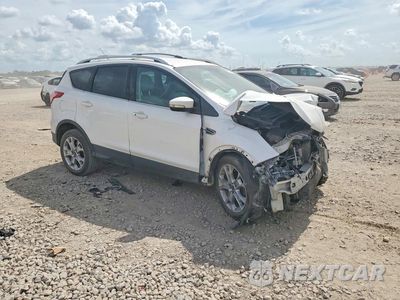 Czwarte zdjęcie samochodu z boku: 2015 FORD ESCAPE TITANIUM VIN:1FMCU0J92FUC26875 - miniatura
