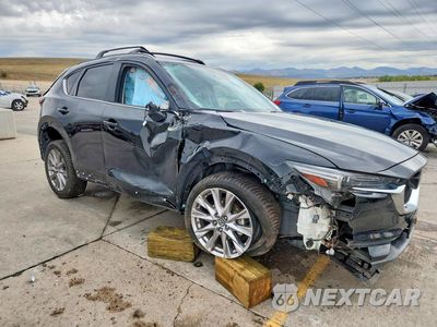 Czwarte zdjęcie samochodu z boku: 2019 MAZDA CX-5 GRAND TOURING VIN:JM3KFBDM3K1507723 - miniatura