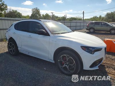 Czwarte zdjęcie samochodu z boku: 2024 ALFA ROMEO STELVIO TI VIN:ZASPAKBNXR7D90990 - miniatura