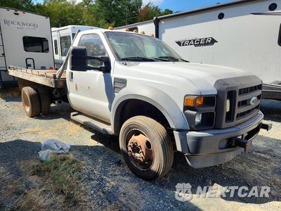Czwarte zdjęcie samochodu z boku: 2010 FORD F550 SUPER DUTY VIN:1FDAF5GR1AEB39512 - miniatura
