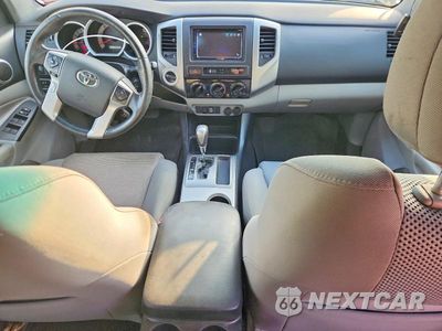 Zdjęcie 8 z 12 samochodu: 2014 TOYOTA TACOMA V6 VIN:3TMLU4EN9EM149377 - miniatura