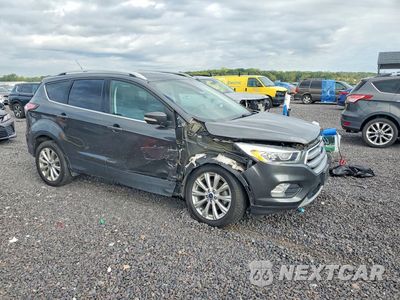 Czwarte zdjęcie samochodu z boku: 2017 FORD ESCAPE TITANIUM VIN:1FMCU0JD3HUA59904 - miniatura