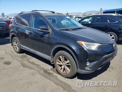 Czwarte zdjęcie samochodu z boku: 2018 TOYOTA RAV4 XLE VIN:2T3WFREV5JW479787 - miniatura