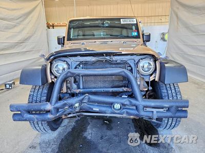 Piąte zdjęcie samochodu w środku: 2015 JEEP WRANGLER UNLIMITED SPORT VIN:1C4BJWDG4FL712387 - miniatura