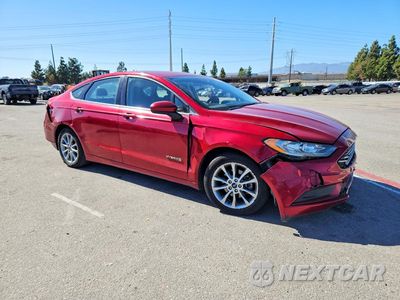 Czwarte zdjęcie samochodu z boku: 2017 FORD FUSION SE HYBRID VIN:3FA6P0LU2HR231150 - miniatura