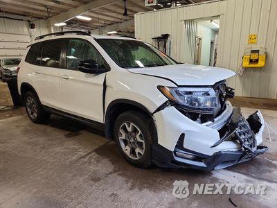 Czwarte zdjęcie samochodu z boku: 2023 HONDA PASSPORT TRAIL SPORT VIN:5FNYF8H68PB007864 - miniatura