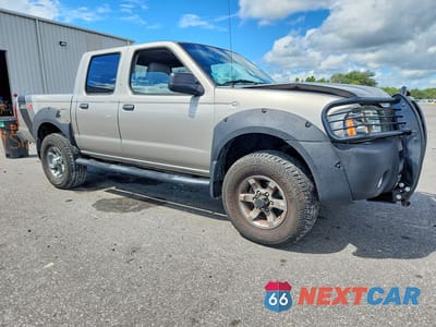 Czwarte zdjęcie samochodu z boku: 2002 NISSAN FRONTIER XE-V6 VIN:1N6ED27Y02C378223 - miniatura