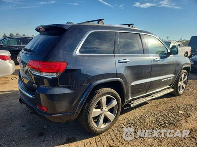 Trzecie zdjęcie samochodu z tyłu: 2014 JEEP GRAND CHEROKEE OVERLAND VIN:1C4RJFCG2EC132246 - miniatura