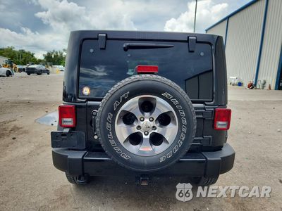 Zdjęcie 6 z 13 samochodu: 2017 JEEP WRANGLER UNLIMITED SAHARA VIN:1C4BJWEG6HL627536 - miniatura