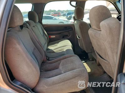 Zdjęcie 10 z 12 samochodu: 2003 CHEVROLET TAHOE C1500 VIN:1GNEC13V03R250825 - miniatura