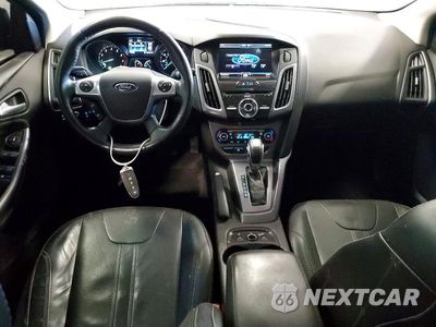 Zdjęcie 8 z 12 samochodu: 2014 FORD FOCUS TITANIUM VIN:1FADP3N22EL258900 - miniatura